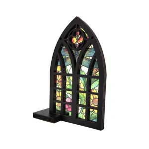Detailed view of the gothic arch wooden stained glass window ornament with dragonfly floral decor.