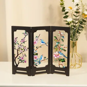 Detailed view of vintage miniature 3-panel screen with stained glass floral bird art.
