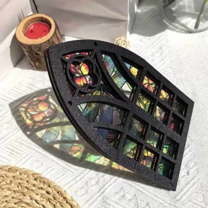Detailed view of gothic window style wooden translucent stained glass butterfly decor piece