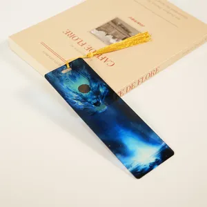 Acrylic dragon pattern bookmark with golden tassel, perfect for book lovers & students.