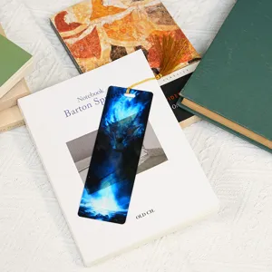 Translucent acrylic dragon bookmark with gold tassel, ideal student stationery and gift.