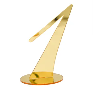 Gold acrylic table number 1 close up detail shot, modern wedding decor display part