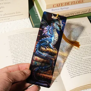 Acrylic blue dragon bookmark with golden tassel, translucent stationery detail for reading lovers.