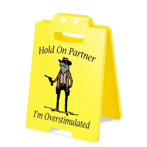 Funny yellow acrylic warning sign desk decor featuring a cool cowboy frog and witty quote.