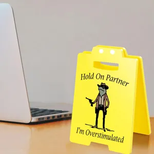Funny mini yellow caution sign desk decor with cowboy frog art and witty quote for office.