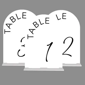 Arched acrylic wedding table number sign with base, clear printed design for party decor.