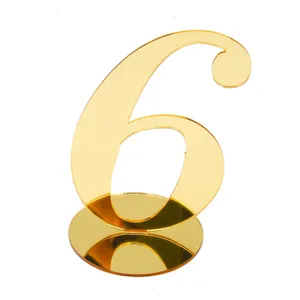 Gold acrylic table number 6 close-up detail shot, perfect for wedding reception decor.