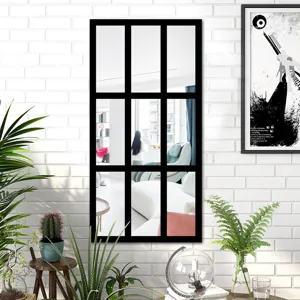 Detailed view of black frame window wall mirror sticker showcasing modern home decor and setup.