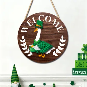 Detailed view of St. Patrick's Day wooden hanging sign featuring cute goose decor and greenery.