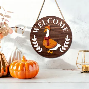 Rustic wooden welcome sign featuring a cute autumn goose design, perfect for home wall decor.