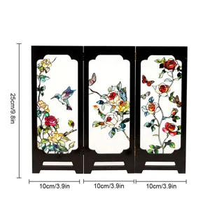 Detailed view of miniature wooden screen with vintage floral and hummingbird stained glass.