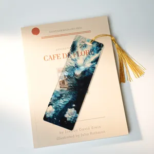 Translucent acrylic bookmark with blue dragon pattern and golden tassel for reading and study.