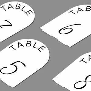 Arch wedding table number sign detail close-up, modern minimalist design white acrylic card.
