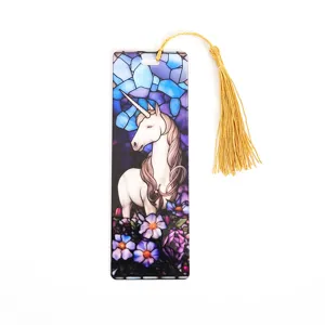 Acrylic stained glass unicorn bookmark detail with vibrant transparent design and gold tassel.