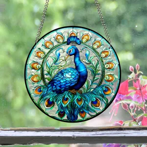 Exquisite stained glass peacock suncatcher with hanging chain, vibrant colors and clear detail.