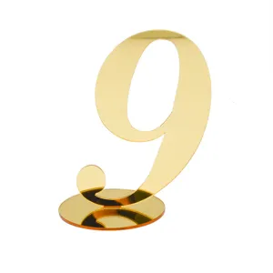 Gold acrylic table number 9 detail shot, showing reflective surface and sturdy round base.