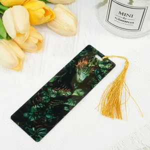 Acrylic dragon pattern bookmark with tassel, translucent detailed view and elegant decor.
