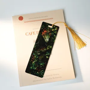 Acrylic dragon bookmark with gold tassel, light-transmissive reading stationery item.