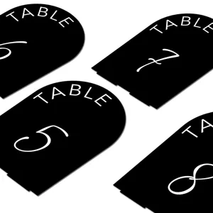 Black acrylic arch table number sign detail view for modern wedding party decorations.