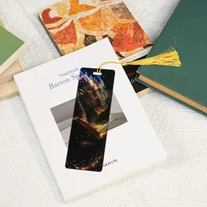 Acrylic dragon bookmark with gold tassel, cute student stationery reading accessory.