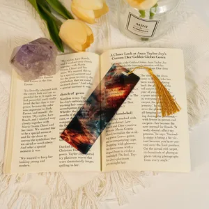 Translucent acrylic dragon bookmark with gold tassel, 1mm thick student stationery craft item.