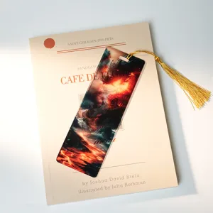 Translucent acrylic bookmark with dragon design and golden tassel for reading lovers.