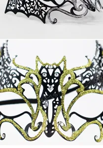 Detailed view of a metal masquerade mask with sparkling rhinestones and glitter for parties.
