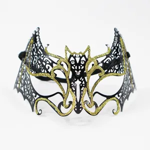 Metal masquerade mask with black and gold glitter finish and rhinestones for party.