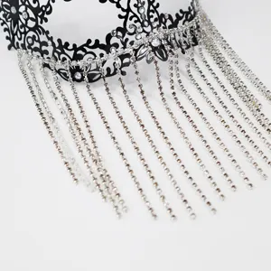 Elegant masquerade metal mask with sparkling rhinestone fringe for party and ball.