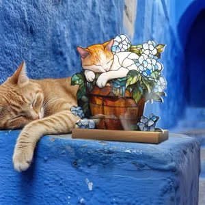 Detailed scene of cat acrylic desktop ornament featuring floral stained glass style on wood base.