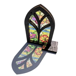 Stained glass wooden window ornament tabletop decor with colorful floral light shadow detail.