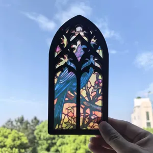 Translucent wooden gothic window hanging decor with blue bird design, ideal for wall or home display.