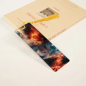 Acrylic bookmark with fantasy dragon design and golden tassel, perfect reading accessory.