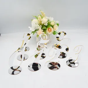 Acrylic table numbers with mirrored base, modern wedding seating signs for restaurant party decor.
