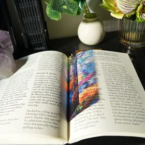Translucent stained glass acrylic bookmark with colorful light refraction for reading.