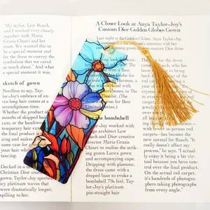 Beautiful colorful stained glass style acrylic bookmark with elegant golden tassel.