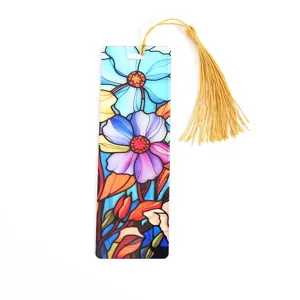 Colorful acrylic floral bookmark with gold tassel, translucent artistic page marker.