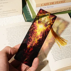 Stained glass style acrylic bookmark with gold tassel, translucent crown design for reading.