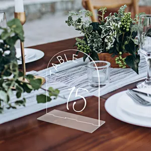 Clear acrylic arch table number sign for wedding reception, elegant tabletop decor card.