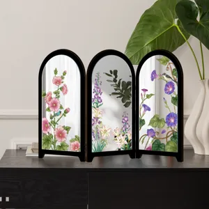 Detailed view of the tabletop three-fold mini mirror screen with floral botanical art.