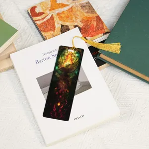 Acrylic transparent bookmark with golden tassel and phoenix stained glass design for books.