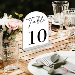 Clear details of the arch acrylic wedding table number sign with base, perfect for reception decor.