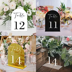 Arch acrylic wedding table number signs with bases, modern clear black white gold decor.