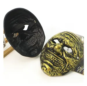 Horror clown mask detail, gold and black texture, thick plastic Halloween party prop.