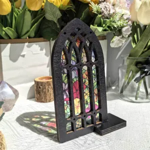 Wooden arched window ornament with floral translucent panel for home tabletop decor.