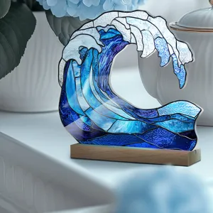 Detailed view of the stained-glass style acrylic ocean wave desktop ornament on wooden base.