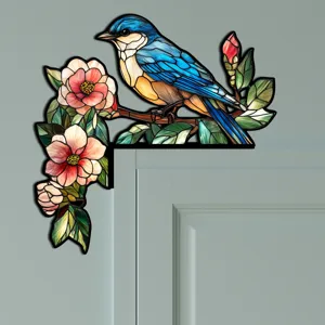Dettaglio adesivo angolo porta uccello blu vetrate con design d'arte floreale.
