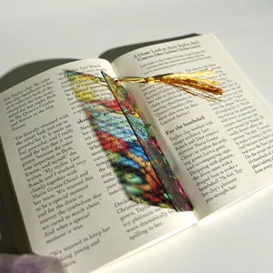 Creative colorful translucent acrylic bookmark with gold tassel for reading book.