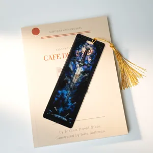 Close-up detail of the transparent acrylic bookmark featuring stained glass fantasy sword design.