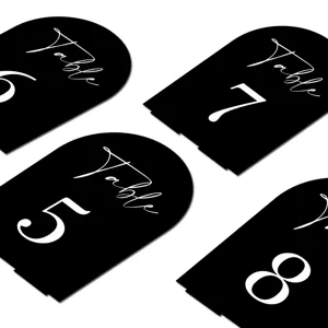 Modern black acrylic arched table numbers for wedding reception decor and event seating sign.